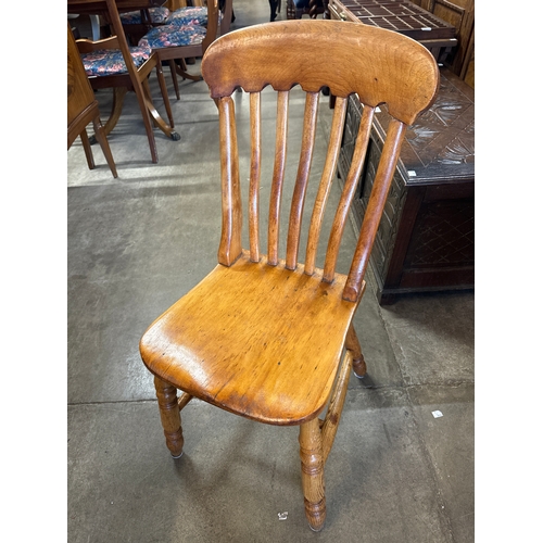 257 - A set of four Victorian beech farmhouse kitchen chairs