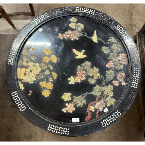 261 - An oriental black lacquered chinoiserie circular coffee table