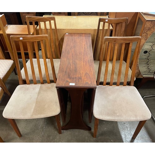 27 - A G-Plan Fresco teak drop-leaf table and four chairs