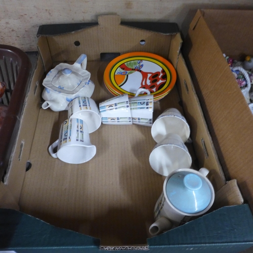 1012 - Three boxes of mixed decorative china including small teapots, retro tea wares, Clarice Cliff style ... 