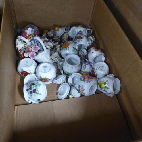 1012 - Three boxes of mixed decorative china including small teapots, retro tea wares, Clarice Cliff style ... 