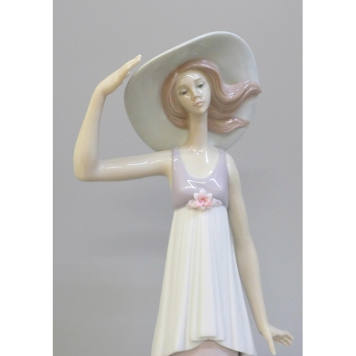 602 - A Lladro figure of a girl wearing a sun hat, 6236 backstamp, 35.5cm