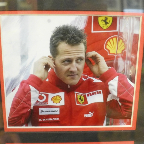 618 - A Michael Schumacher autograph display with Rutland Autographs AFTAL registered C.O.A.