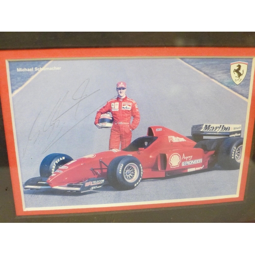 618 - A Michael Schumacher autograph display with Rutland Autographs AFTAL registered C.O.A.