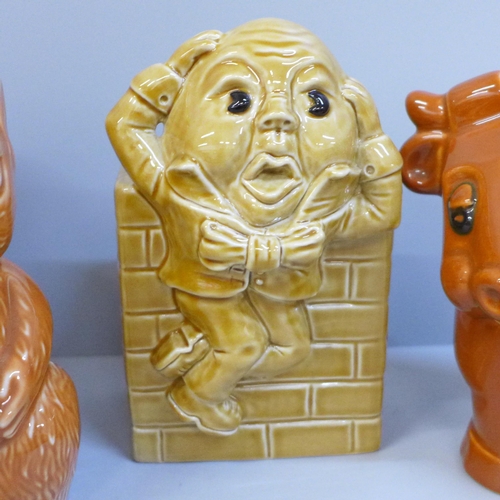 632 - Three Wade money boxes; Humpty Dumpty, cow and squirrel