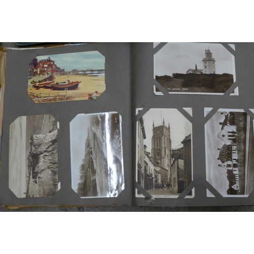 664 - A collection of postcards, all 20th Century onwards including two albums and other loose cards and s... 