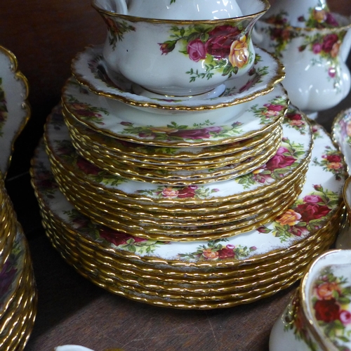 665 - A Royal Albert Old Country Roses six setting tea and dinner service with dinner, side and tea plates... 