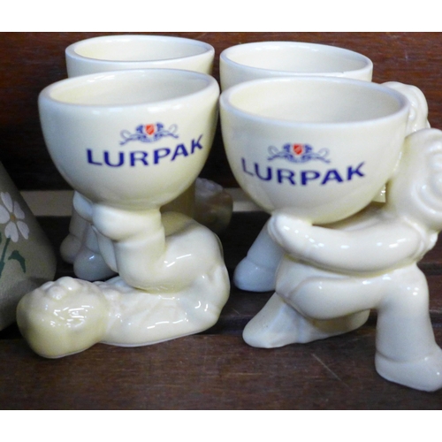 673 - A collection of Lurpak table wares, a Denby coffee pot, a Poole pottery teapot, a Langley vase and a... 