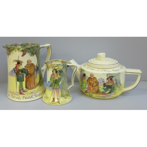 676 - Two Royal Doulton Robin Hood Series Ware jugs, one jug with hairline crack and a teapot