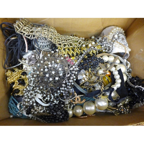 680 - A collection of costume jewellery including necklaces, bracelets, etc.