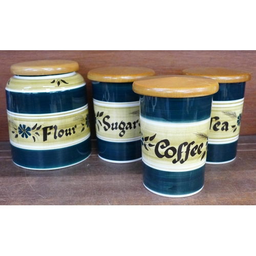 683 - Four Tony Raymond storage jars