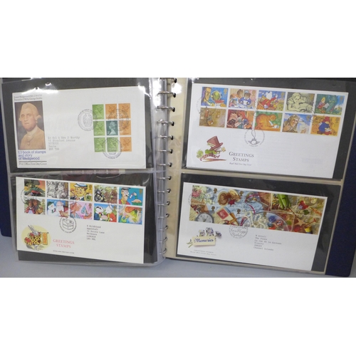 687 - Stamps; an album of GB booklets including £1 Wedgwood and booklet panes on first day covers, face va... 