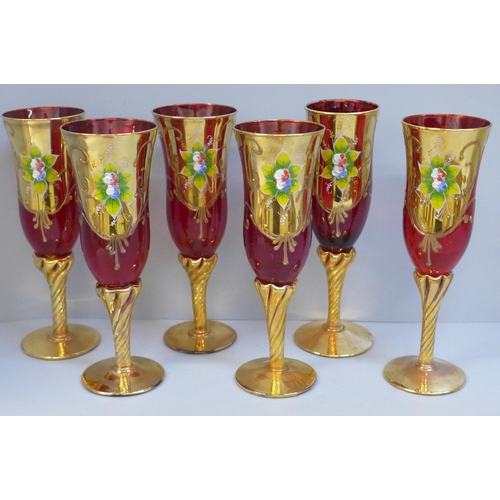 690 - A set of six Bohemian ruby glass and gold wines