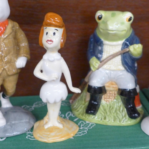 695 - A collection of Beswick figures; Rupert Bear, Podgy Pig, Fly Fishing, Droopy, Wilma Flintstone and E... 