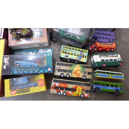 702 - A collection of die-cast buses and vehicles including Corgi, some boxed