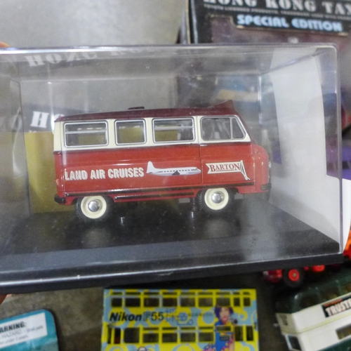 702 - A collection of die-cast buses and vehicles including Corgi, some boxed