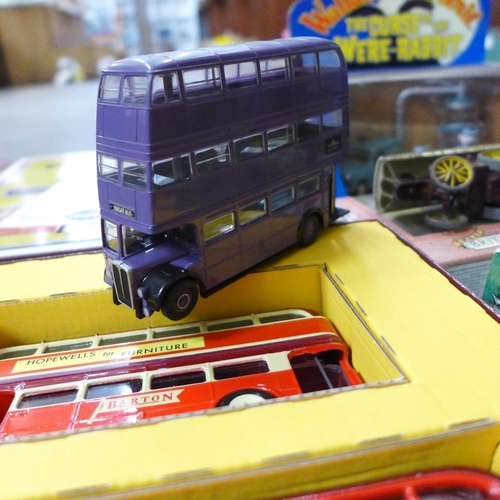 702 - A collection of die-cast buses and vehicles including Corgi, some boxed