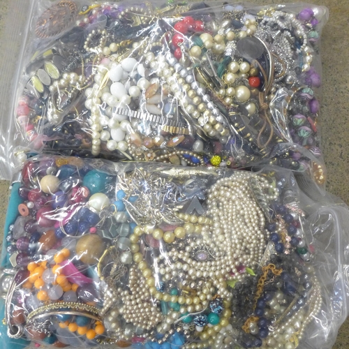 709 - Two bags of costume jewellery