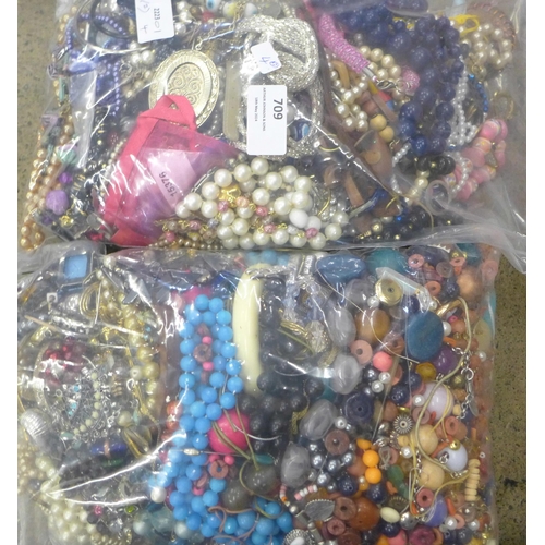 709 - Two bags of costume jewellery