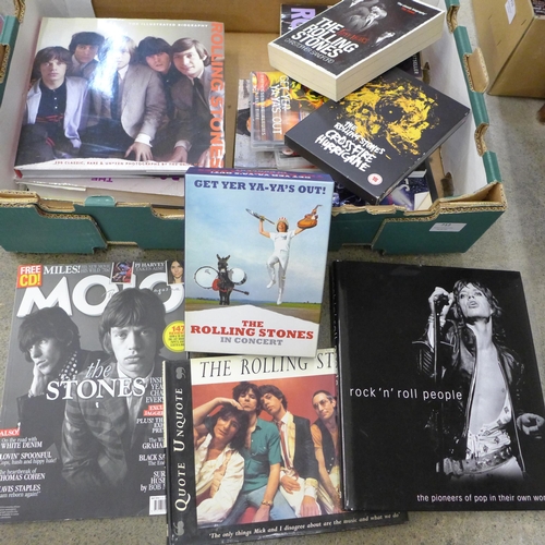 712 - A box of Rolling Stones books and DVDs and a 'Get Yer Ya-Ya's Out' CD and DVD box set