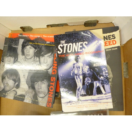 712 - A box of Rolling Stones books and DVDs and a 'Get Yer Ya-Ya's Out' CD and DVD box set