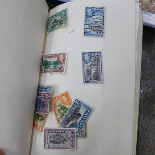 714 - Stamps; a box of stamps, covers, etc., loose and in albums