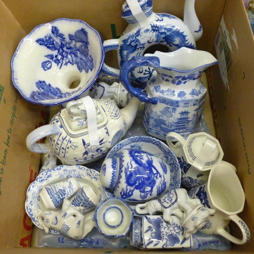 725 - Mixed blue and white oriental style china, including a toroidal teapot with four character mark to b... 