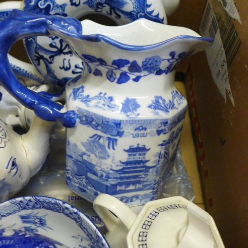 725 - Mixed blue and white oriental style china, including a toroidal teapot with four character mark to b... 