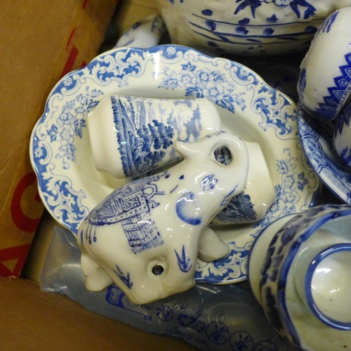 725 - Mixed blue and white oriental style china, including a toroidal teapot with four character mark to b... 