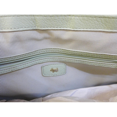 727 - Two Radley pink and pistachio handbags, both with dust bags