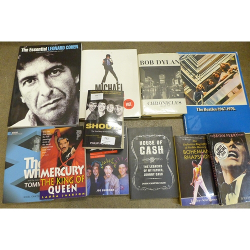 733 - Eleven music books including Bob Dylan, Queen, The Beatles, etc.