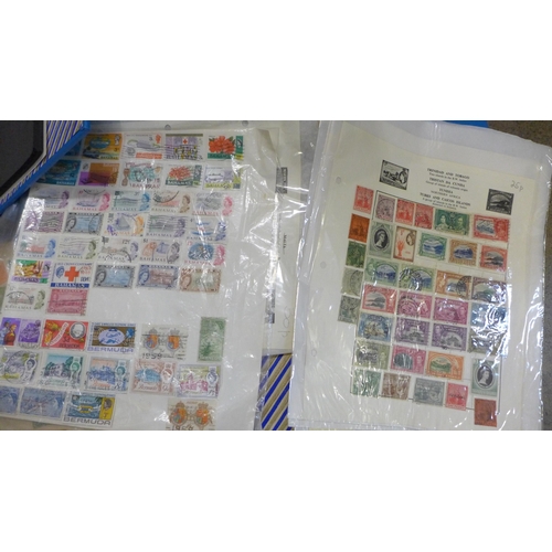 738 - A collection of stamp sheets and albums, and four new stamp collecting folders (hold 500 stamps each... 