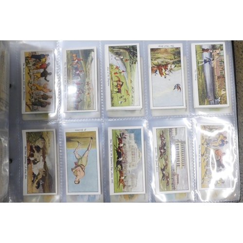 745 - Three albums of cigarette cards and silks including John Players, Ogdens, Kensitas, Gallaher and oth... 