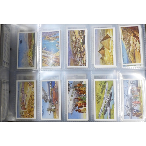 745 - Three albums of cigarette cards and silks including John Players, Ogdens, Kensitas, Gallaher and oth... 