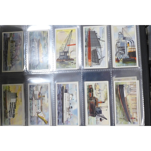 745 - Three albums of cigarette cards and silks including John Players, Ogdens, Kensitas, Gallaher and oth... 