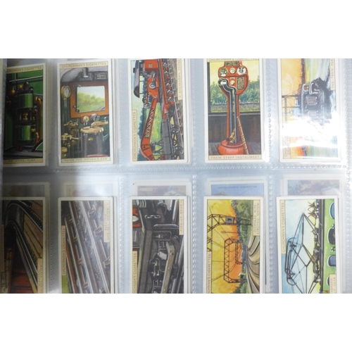 745 - Three albums of cigarette cards and silks including John Players, Ogdens, Kensitas, Gallaher and oth... 