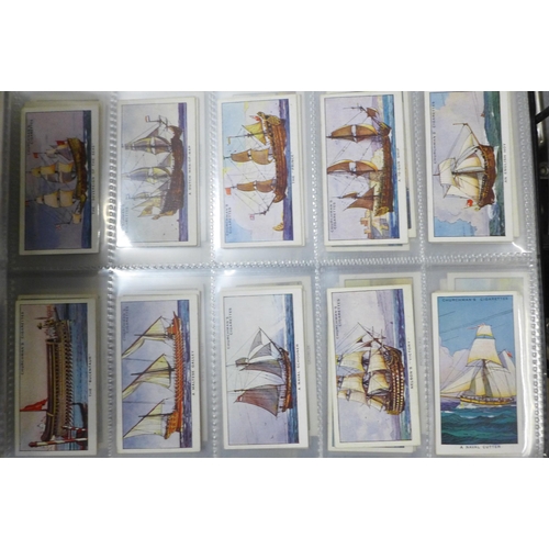 745 - Three albums of cigarette cards and silks including John Players, Ogdens, Kensitas, Gallaher and oth... 