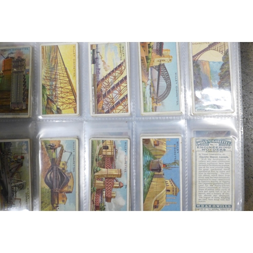 745 - Three albums of cigarette cards and silks including John Players, Ogdens, Kensitas, Gallaher and oth... 