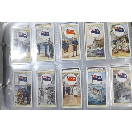 745 - Three albums of cigarette cards and silks including John Players, Ogdens, Kensitas, Gallaher and oth... 