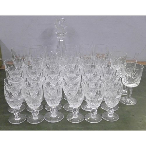 756A - A set of Waterford Crystal drinking glasses; six champagne glasses, six wine glasses, six sherry gla... 