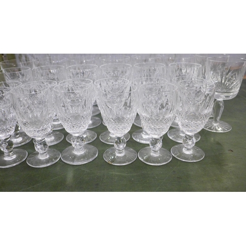 756A - A set of Waterford Crystal drinking glasses; six champagne glasses, six wine glasses, six sherry gla... 