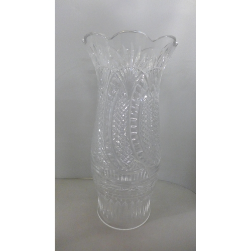 757D - Waterford Crystal; tall candle hurricane light and stand, a pair of seahorse candlesticks, all boxed... 