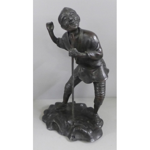 761 - A Chinese spelter figure of an elder, 27cm