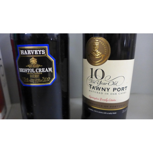 766 - A bottle of Harveys Bristol Cream, two bottles of Port, Ten Year Old Tawny and Ten Year Warre's Old ... 