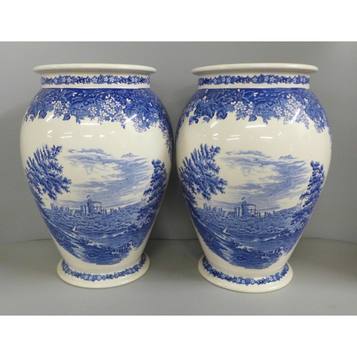 780 - A pair of Wedgwood Windsor Castle blue and white vases, 32cm