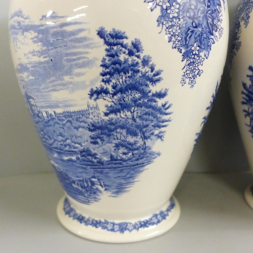 780 - A pair of Wedgwood Windsor Castle blue and white vases, 32cm