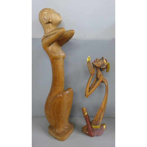 781 - Two Eastern carvings, tallest 57cm, both a/f