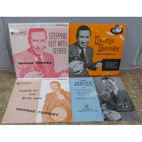 784 - A cased banjo, marked Keech, with four George Formby EPs