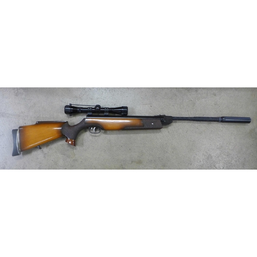 785 - A Weihrauch HW80 4.5 .177 calibre air rifle, with scope and silencer