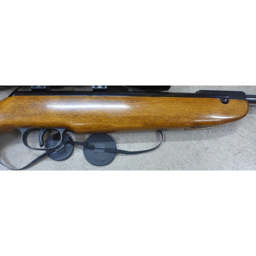 786 - A Weihrauch HW30 .177 calibre air rifle, with scope and silencer